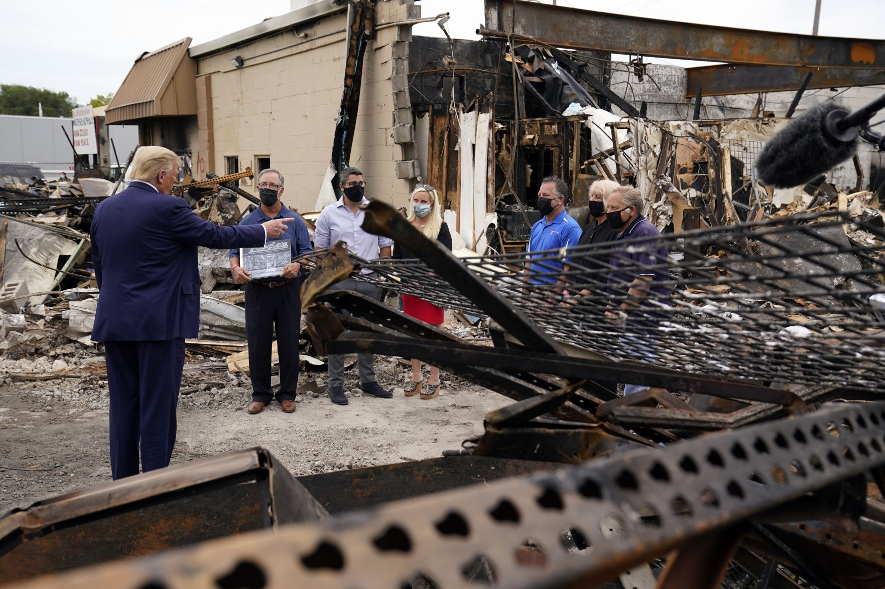 Owner of burned Kenosha camera shop accuses Trump of misleading public